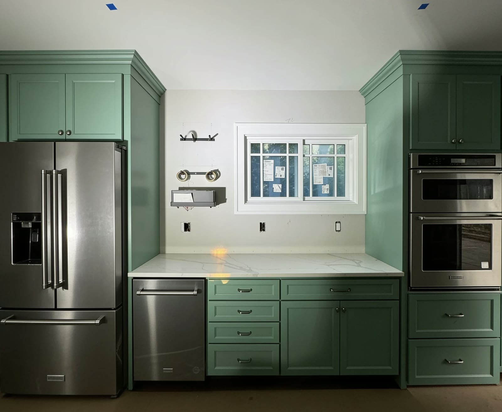 Cabinets, sage to navy, before