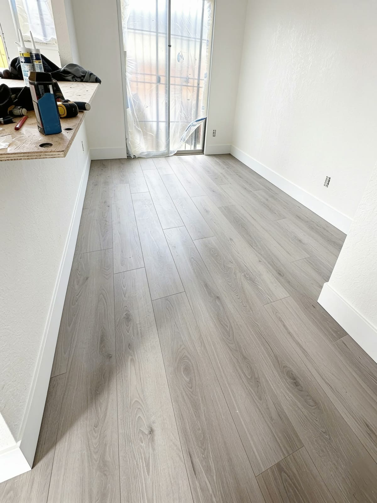 The room after: new plank flooring